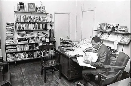  ??  ?? King sits in his office at SCLC headquarte­rs in Atlanta. In March 1968, he arrived in Memphis to campaign for economic justice.