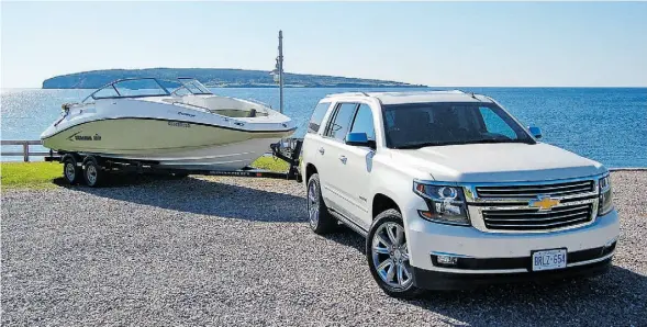  ?? Photos: Derek McNaughton/Driving ?? The 2015 Chevrolet Tahoe towed this 5,200-pound boat and trailer over Quebec’s stunningly beautiful — but hilly — Gaspé roads, with aplomb.