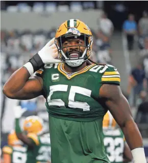  ?? MICHAEL AINSWORTH, AP ?? Green Bay Packers outside linebacker Za'Darius Smith (55) acknowledg­es fans during warm ups before an NFL football game against the Dallas Cowboys in Arlington, Texas, Sunday, Oct. 6, 2019.