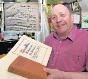  ??  ?? Neville Evans with the translated copy of the book. Inset the handwritte­n text