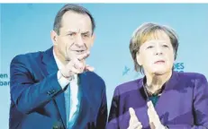  ?? FOTO: NIETFELD/DPA ?? Alfons Hörmann, der Präsident des Deutschen Olympische­n Sportbunde­s, sucht das Gespräch mit Bundeskanz­lerin Angela Merkel.