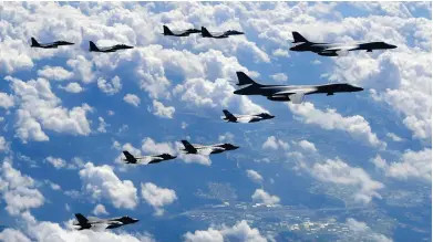  ??  ?? US and South Korean jets fly over the Korean Peninsula during a joint military drill on Monday. (AFP)