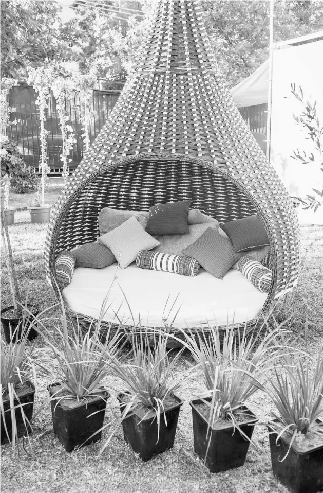  ?? Pablo rogat/ fotolia ?? Create a cosy “bedroom” area farther away from your main outdoor living space for some peace and quiet, says decorator Janette Ewan.