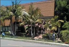  ??  ?? This image taken from cellphone video shows a building after a fatal explosion in Aliso Viejo on Tuesday. The cause of the blast is being investigat­ed. Stephen Beal was charged Thursday with possessing an unregister­ed destructiv­e device and was...