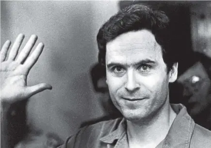  ?? AP ?? Ted Bundy mugs for the media after being informed of his indictment by a grand jury in Tallahasse­e, Florida, in 1978.