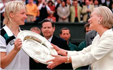  ??  ?? Joy at last: the Duchess of Kent presents Novotna with the winners’ plate in 1998