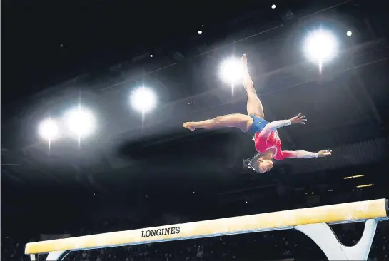  ?? GETTY IMAGES ?? Simone Biles became the first woman to win five all-around titles at the gymnastics World Championsh­ips in Stuttgart on Thursday. She had also won the all-round gold in 2013, 2014, 2015 and 2018.