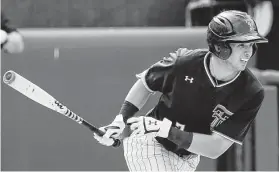  ?? Nate Billings / The Oklahoman ?? Texas Tech’s Gabe Holt had three hits and three RBIs in the Red Raiders’ 7-5 comeback victory over Kansas on Friday.