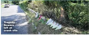  ??  ?? Tragedy... flowers left at crash site