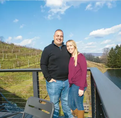  ?? BOB YURKO PHOTOS/SPECIAL TO THE MORNING CALL ?? Josh and Kristy Gier, of Whitehall Township, seen here Nov. 18, are the new owners of Blue Mountain Vineyards and Cellars just outside New Tripoli.