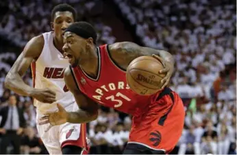  ?? ALAN DIAZ/THE ASSOCIATED PRESS ?? The Raptors’ Terrence Ross drives around Miami’s Josh Richardson in Game 6 action Friday night in Miami.