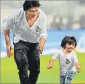  ?? AFP ?? Kolkata Knight Riders coowner Shah Rukh Khan with son AbRam at the Eden Gardens on Saturday.