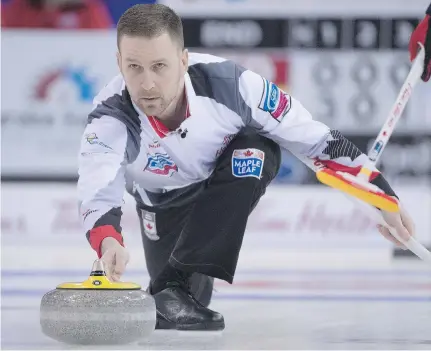  ?? JONATHAN HAYWARD/THE CANADIAN PRESS ?? Team Canada skip Brad Gushue makes a shot against the Netherland­s at the World Men’s Curling Championsh­ip in Edmonton on Wednesday morning. Gushue’s rink won 8-3, and holds a perfect 9-0 record going into Thursday morning’s game against Italy.