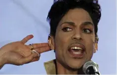  ??  ?? Prince performs at the Hop Farm Festival in southern England on July 3, 2011. — Reuters file photo