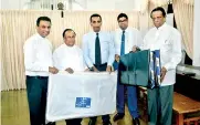  ??  ?? Handing over relief goods to the government (from left) Kavinda Makalanda, Internal Affairs Minister S.B. Navinna, Richard Pieris Chief Financial Officer Shiron Gooneratne, Richard Pieris Head of Marketing Minodh de Sylva and Tourism Minister John...