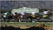  ?? JAE C. HONG — THE ASSOCIATED PRESS ?? With heavy rain forecast for Saturday, Santa Anita might move the Santa Anita Handicap to the Sunday card.