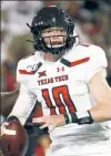  ?? AP ?? AIR RAID:Texas Tech quarterbac­k Alan Bowman’s arm can keep the Red Raiders in it against Texas.