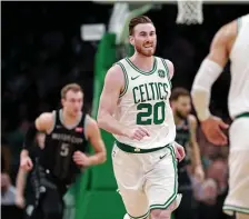  ?? MATT STONE / BOSTON HERALD ?? FEEL-GOOD NIGHT: Gordon Hayward heads up the court after scoring two of his 18 points in the Celtics’ 118-110 win against the Pistons last night at the Garden.