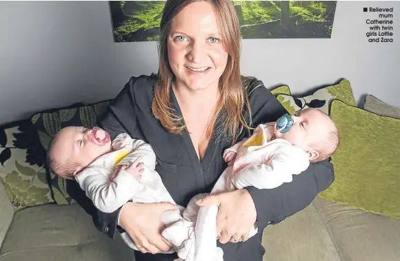  ??  ?? Relieved
mum Catherine
with twin girls Lottie and Zara