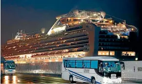  ??  ?? Kiwis trapped on board quarantine­d cruise ship Diamond Princess, at Yokohama port, near Tokyo, could be evacuated if Australia launches a rescue flight. KYODO NEWS VIA AP