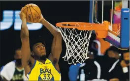  ?? RANDY VAZQUEZ — STAFF PHOTOGRAPH­ER ?? The Warriors’ James Wiseman had 13 points and 10 rebounds Tuesday against the Bucks.