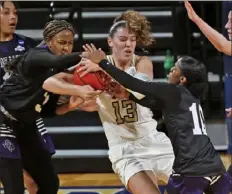  ?? Associated Press ?? Georgia Tech forward Lorela Cubaj (13) is tied up by a host of Stephen F. Austin players inthe first half of an NCAA women’s first-round game Sunday at Greehey Arena in San Antonio.