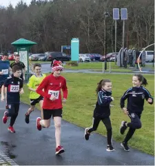  ??  ?? Enjoying the Turkey Trot in Doorly Park for St John’s FC.