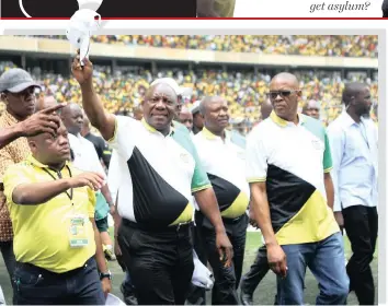  ??  ?? PRESIDENT Cyril Ramaphosa with Sihle Zikalala (left) and Ace Magashule acknowlege the cheers of the party faithful as they arrive at the launch of the ANC manifesto at Moses Mabhida Stadium yesterday. | Bongani Mbatha /African News Agency (ANA)