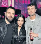  ?? ?? At the Brits with grandmothe­r Fion Morgan, top; and Johnny McDaid of Snow Patrol and Courtney Cox, above