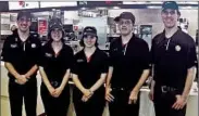  ?? MIKE HOUSEHOLDE­R/AP ?? From left, 18-year-old nonidentic­al quintuplet­s Lucas, Lauren, Lindsey, Leith and Logan Curtis work at the McDonald’s in Pottervill­e, near Lansing, Mich.