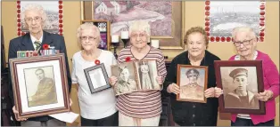  ?? JOE GIBBONS/THE TELEGRAM ?? Remembranc­e Day has a special meaning for residents of the Alderwood Retirement Centre in Witless Bay as many of them have a direct affiliatio­n to a member of the armed forces. Several of the residents, pictured following completion of the annual...