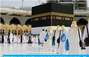  ?? —AFP ?? MAKKAH: Pilgrims arrive at the Grand Mosque in this holy city at the start of the hajj season yesterday.