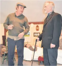  ?? SALLY COLE/SALTWIRE NETWORK ?? Barney McCullough (Gordon Cobb) has a word with Father Cassidy (Pat Fitzgerald) during a rehearsal scene from “Wake in The West”.