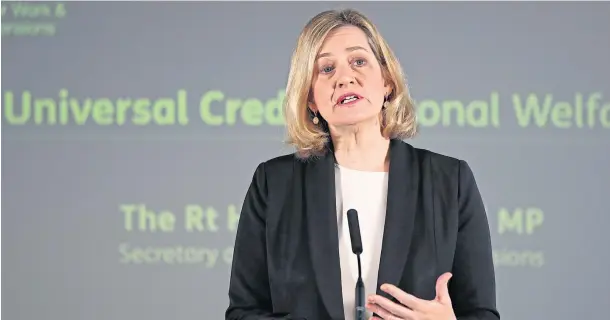  ??  ?? TURNAROUND: Amber Rudd said at London’s Kennington Jobcentre that it was “not right” that the two-child limit was being made retrospect­ive from February