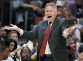  ?? JOE SKIPPER — THE ASSOCIATED PRESS ?? Philadelph­ia 76ers head coach Brett Brown directs his team in the first quarter of play against the Miami Heat in Game 4 of a first-round NBA basketball playoff series, Saturday.