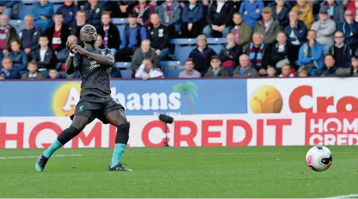  ?? Photo: AFP ?? Liverpool striker Sadio Mane calmly slots in the second goal in their 3-0 win over Burnley at Turf Moor in Lancashire, England on August 31, 2019.