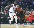  ?? AP photo ?? OG Anunoby of the Raptors drives past the Knicks’ Julius Randle on Monday.