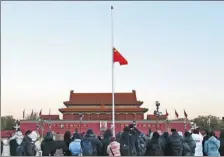  ?? Zou Hong / cHina daily ?? The national flag flies at half-staff at Tian’anmen Square on Thursday.