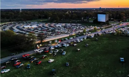  ??  ?? A Jurassic Park and The Flintstone­s double bill at the McHenry Outdoor Theater in Illinois. Photograph: Tannen Maury/EPA