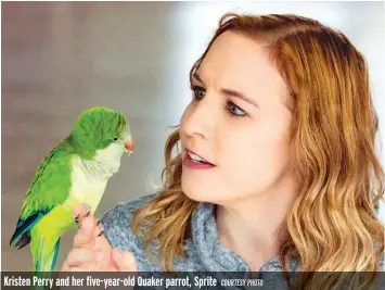  ?? COURTESY PHOTO ?? Kristen Perry and her five-year-old Quaker parrot, Sprite