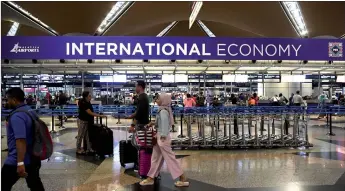  ??  ?? Operations at the KLIA have resumed to normal following systems disruption since Wednesday, which caused flight delays. — Bernama photo