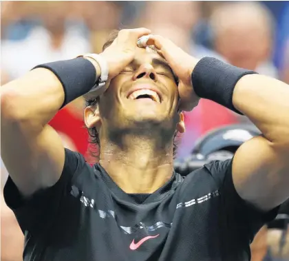  ?? Picture / AP ?? How sweet it is as Rafael Nadal reacts to putting away Kevin Anderson in the US Open final in New York.