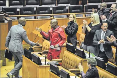  ??  ?? Pals: Democratic Alliance leader Mmusi Maimane greets the Economic Freedom Fighters’ Julius Malema. The DA and other smaller parties will have to maintain good relations for a national coalition to work. Photo: Lulama Zenzile/ Beeld/Gallo Images