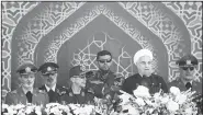  ?? AP/EBRAHIM NOROOZI ?? Iran’s President Hassan Rouhani (second right) speaks Friday at a military parade just outside Tehran, Iran.
