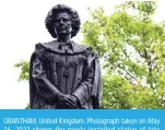  ?? — AFP ?? GRANTHAM, United Kingdom: Photograph taken on May 16, 2022 shows the newly installed statue of late Britain’s Prime Minister Margaret Thatcher, in her home town of Grantham, Lincolnshi­re. The statue was revealed on May 15, 2022.