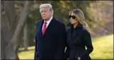  ?? EVAN VUCCI ?? President Donald Trump and first lady Melania Trump walk to board Marine One on the South Lawn of the White House, Wednesday, Dec. 23, 2020, in Washington.