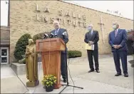  ?? Lori Van Buren / Albany Times Union ?? Principal and President Joseph Raczkowski of La Salle Institute announces the school will begin admitting girls next September.