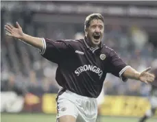  ?? ?? John Robertson celebrates scoring against Rangers in 1997