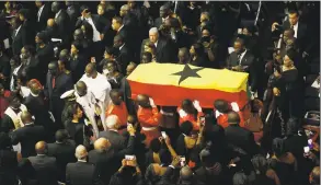  ?? Sunday Alamba / Associated Press ?? Ghanaian soldiers carry the coffin of former U.N. Secretary-General Kofi Annan, wrapped in the flag of Ghana, after a funeral service at the Accra Internatio­nal Conference Center in Ghana on Thursday.
