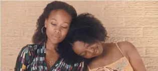  ?? VERTICAL ENTERTAINM­ENT ?? Turquoise (Nicole Beharie, left) and Kai (Alexis Chikaeze) bond over preparing for the pageant in “Miss Juneteenth,” now streaming on digital platforms.